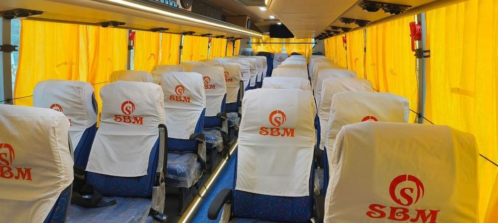 Rows of seats inside an AC bus – Om Shakthi Travels, Chennai