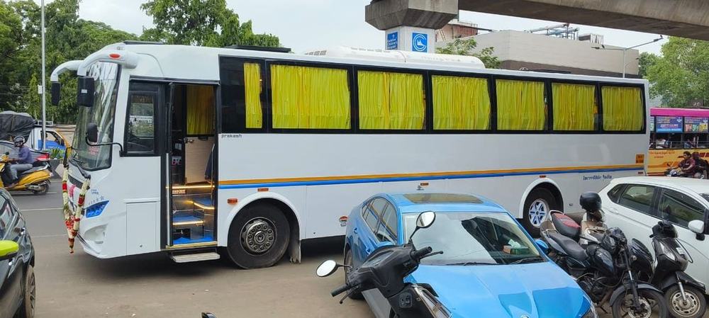 AC bus side view – Om Shakthi Travels, Chennai