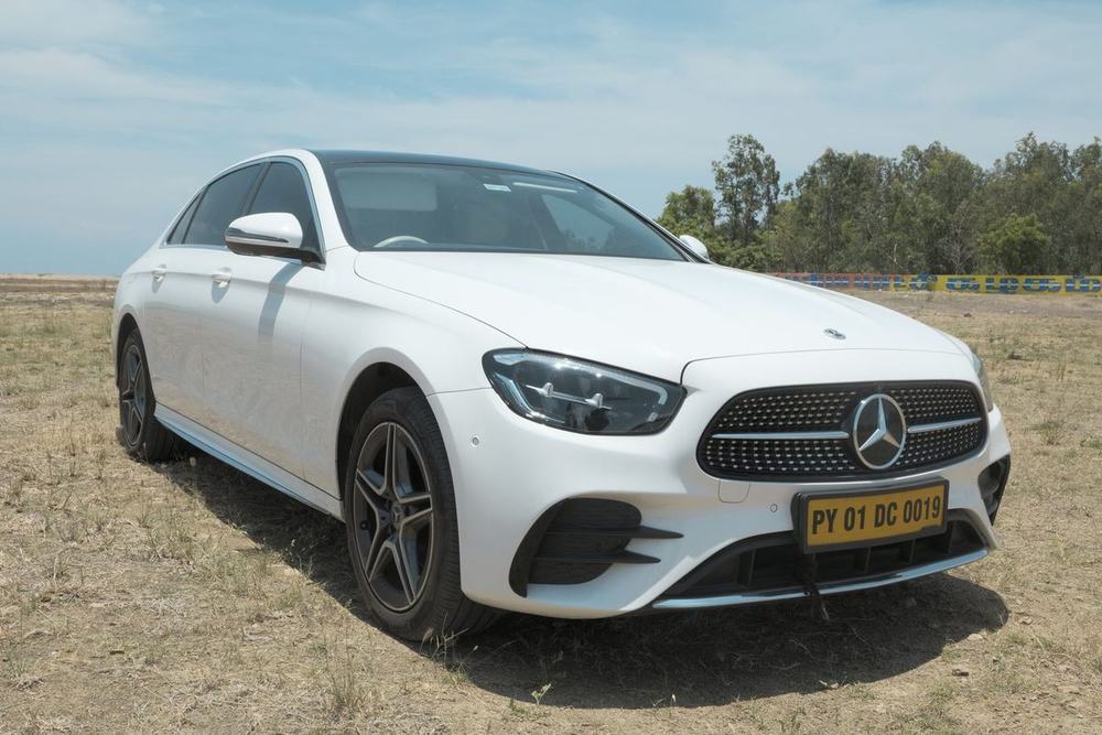 White Mercedes-Benz E-Class three-quarter view – Om Shakthi Travels, Chennai