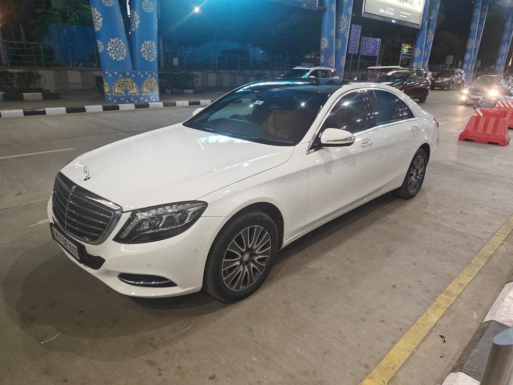 Mercedes-Benz S-Class side view at night – Om Shakthi Travels, Chennai