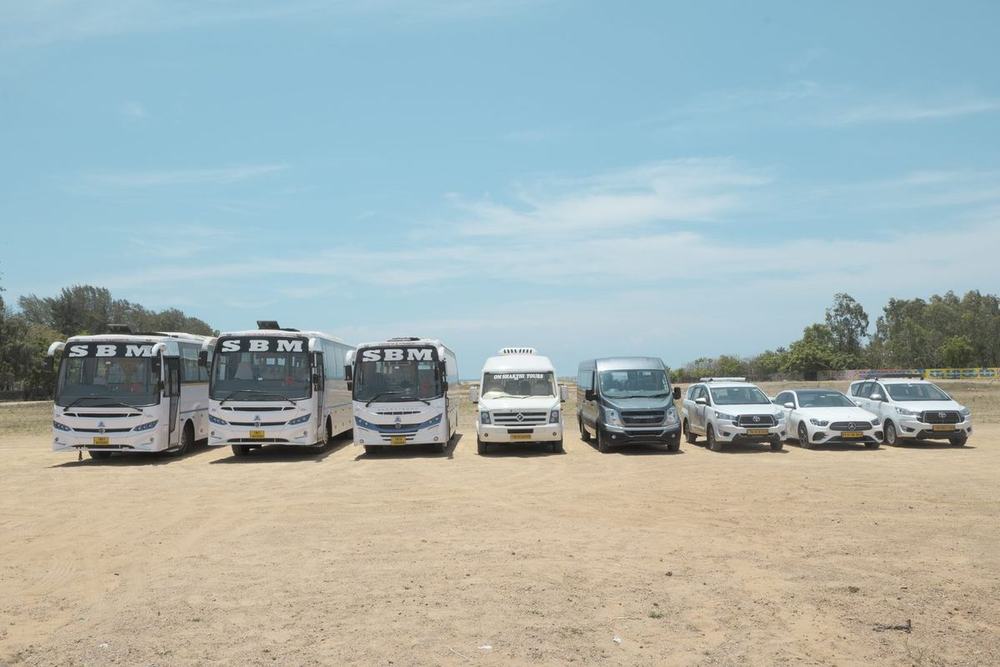 Coaches, vans and SUVs ready for a large event – Om Shakthi Travels, Chennai