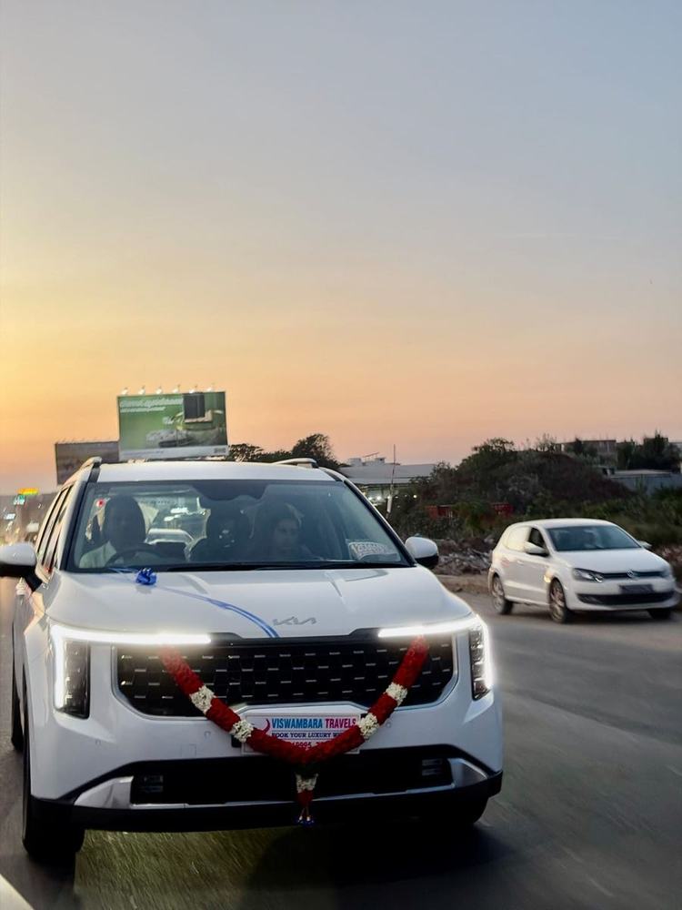 Kia Carnival on delivery day with a flower garland – Om Shakthi Travels, Chennai