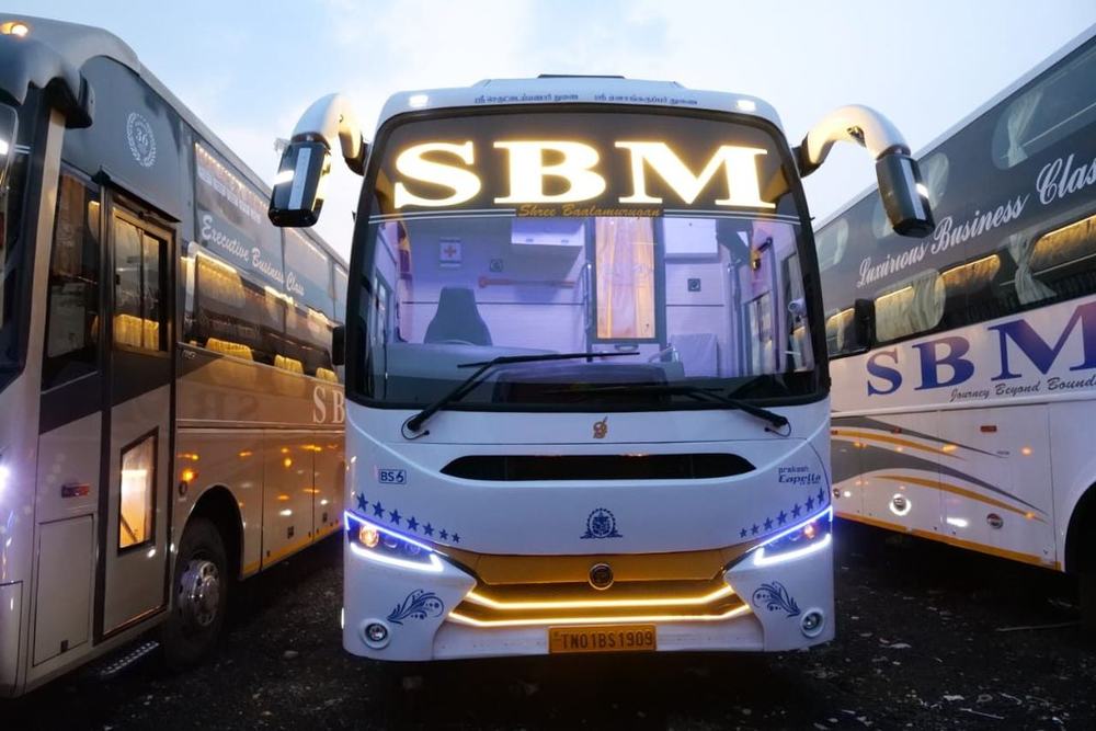Luxury coaches lined up at night – Om Shakthi Travels, Chennai