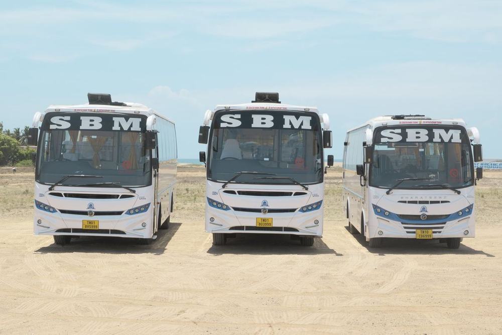 Three luxury coaches lined up – Om Shakthi Travels, Chennai