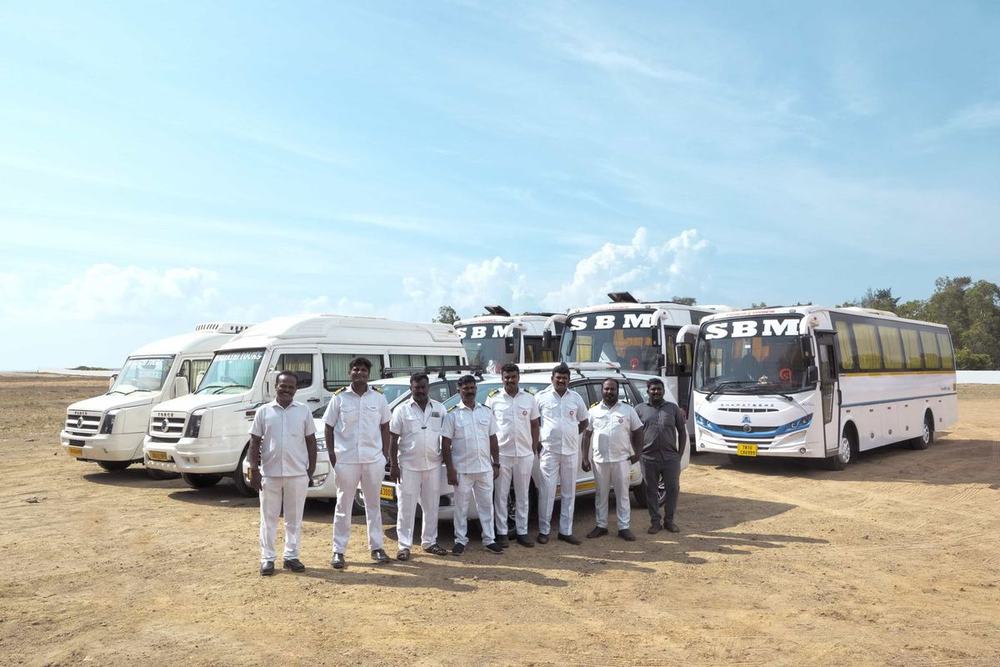 Our uniformed chauffeurs with the fleet – Om Shakthi Travels, Chennai
