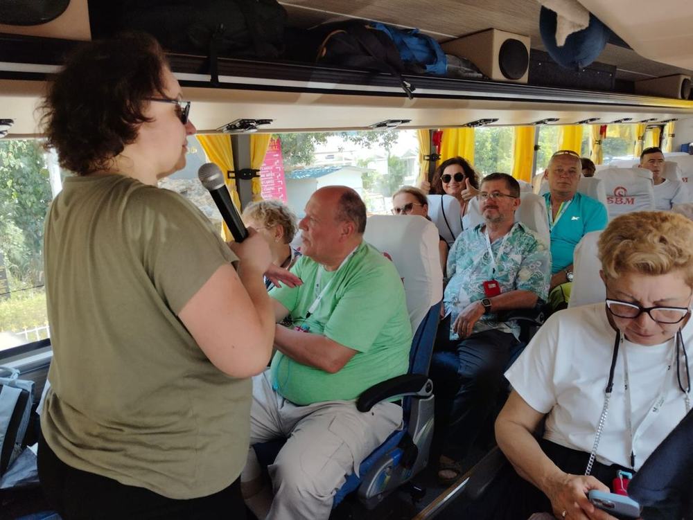 Tour group on board with their guide – Om Shakthi Travels, Chennai