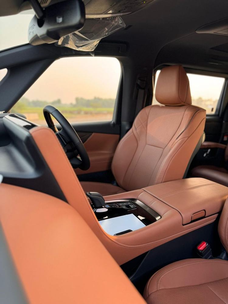 Vellfire front seats in tan leather – Om Shakthi Travels, Chennai